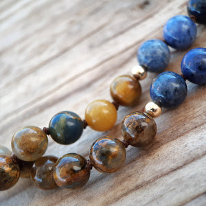 8mm Golden Pietersite and Dumortierite beads with 4mm gold marker bead
